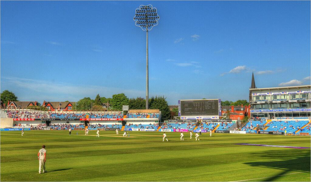 Cricket ground with floodlight towers