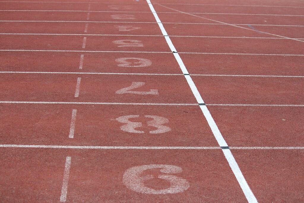 Numbered lanes on a synthetic running track